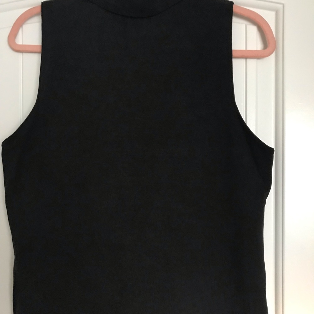 Black short sleeve silk/nylon shirt.